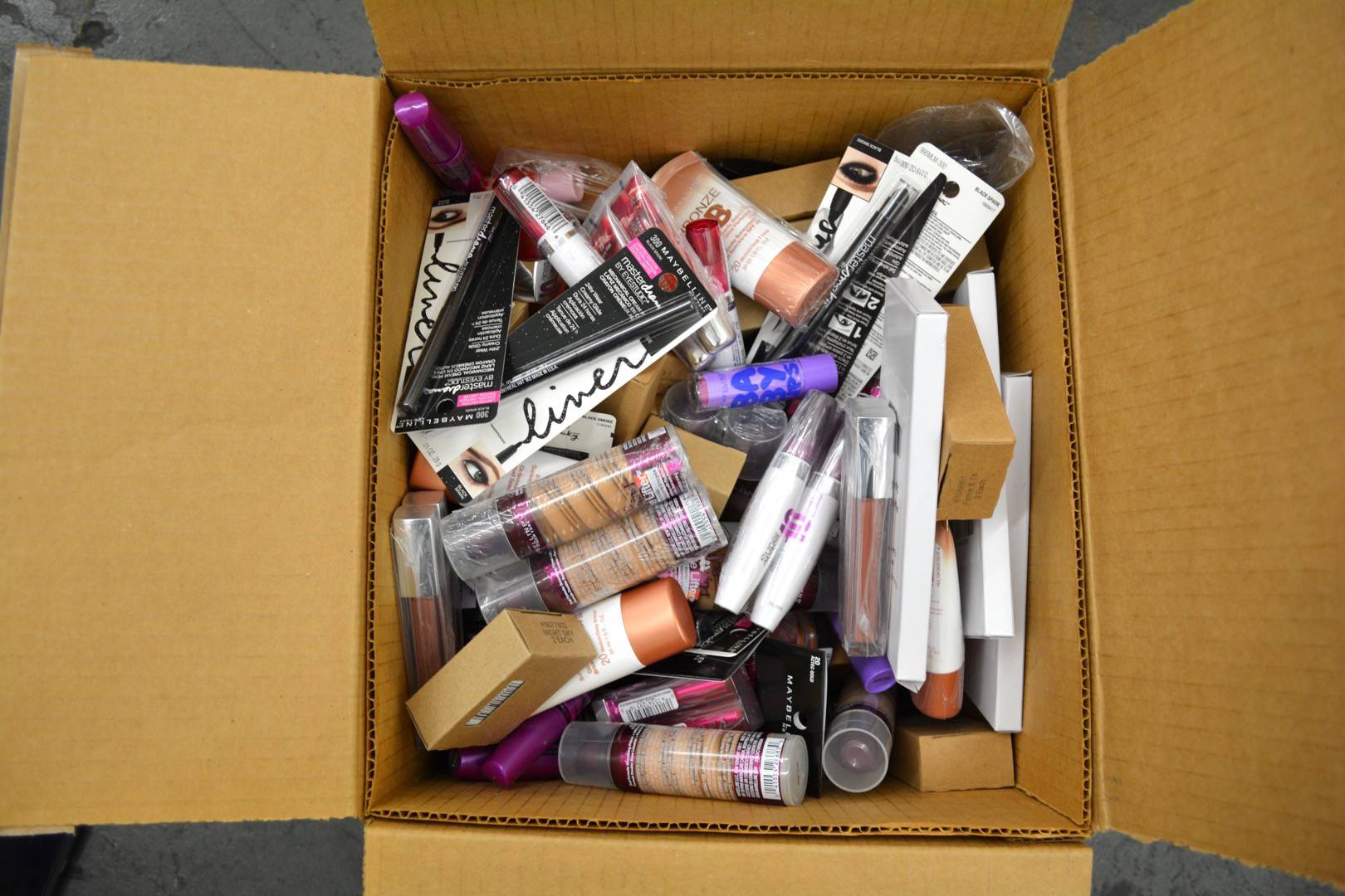 Maybelline New Overstock Cosmetic Lots - Assorted Case Packs of 250 units of New Overstock Maybelline Cosmetics. Partially Manifested.