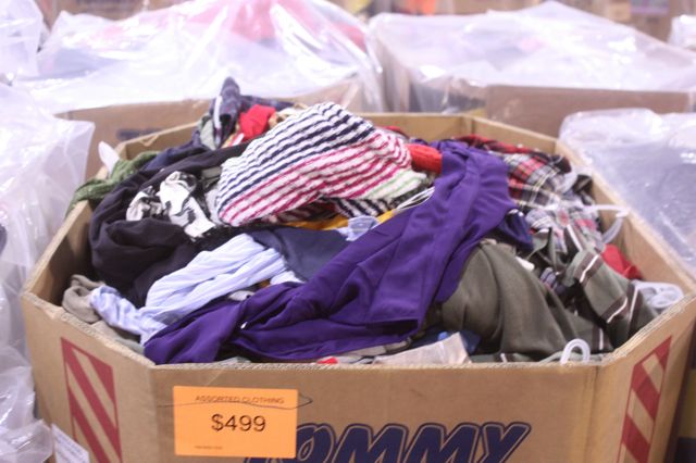 KM Department Store Assorted Mostly Spring/Summer Shelf-Pull Clothing Bins - Bins include a mix of clothing for Men, Women & Kids. Exact mix varies from bin to bin with the majority being Adult Clothing. Items may include: Activewear, Dresses, Jeans, Pants & Leggings, Shorts & Capris, Skirts, Sleepwear, Tops & Tees, Graphic Tees, Joggers, Polo's, Shirts, workwear & more.