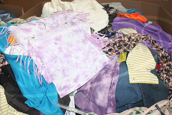 Assorted Department Store Clothing  -250units - Lots consist of an assortment of clothing for men, women and children including but not limited to: < Maternity clothing, slacks, jeans, flannel shirts, t-shirts, jackets, pajamas, robes, denim skirts, cotton skirts, business-casual dresses, polo shirts, sweaters, leggings, dresses, kids' clothing and more.