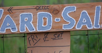 Yard Sales Profits in Retirement yard sale sign
