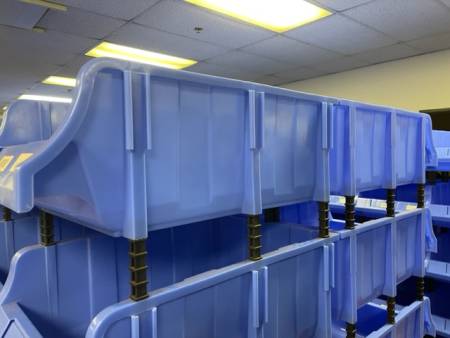 Shelf Pulls Manifested Truckloads of Blue Bins 