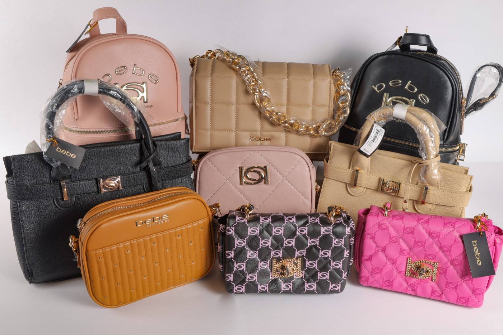 Via Trading  Assorted Bebe New Overstock Handbags Loads